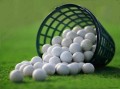 basket of practice golf balls