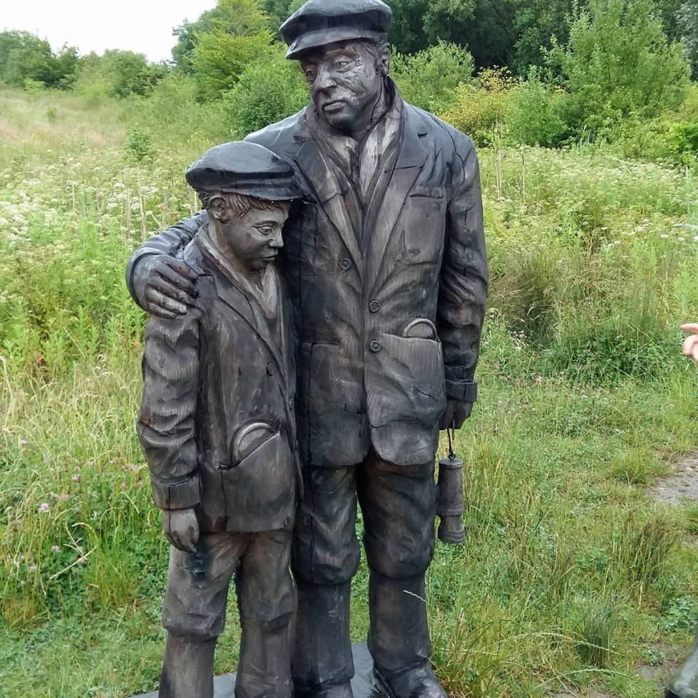 Miner and Son wood Carving
